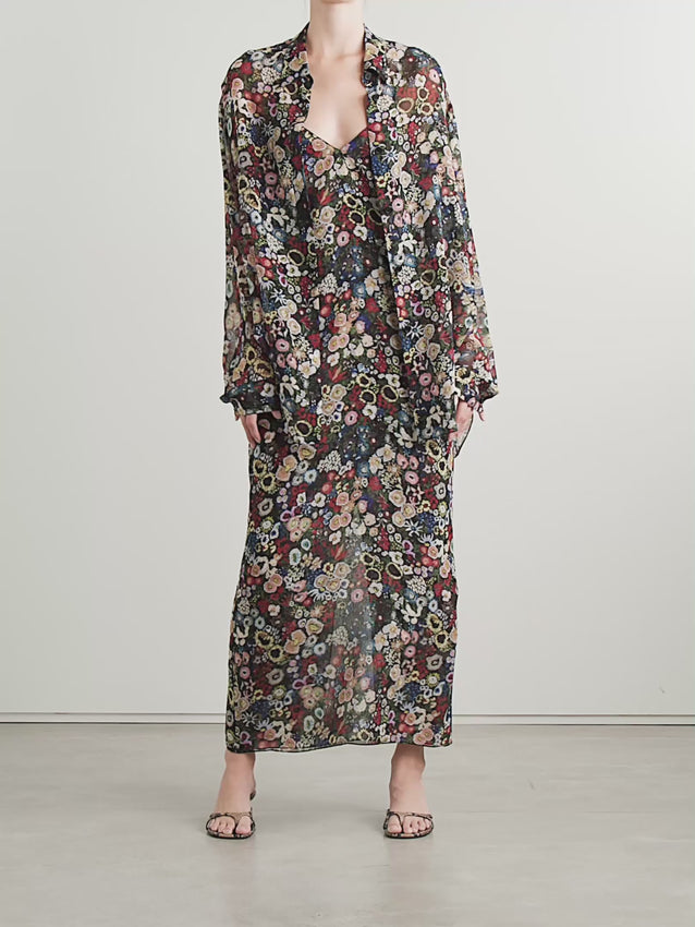 Effortlessly cool and undeniably chic, the Taja dress embodies KHAITE's Spring '26 vision with a '90s-inspired bohemian edge. Crafted from lightweight silk-chiffon, this maxi dress flows with understated elegance, adorned with vibrant floral prints that capture the season's free-spirited mood. Delicate pin-thin straps provide a minimalist silhouette, while the subtle lining beneath the sheer fabric offers refined coverage without compromising the airy aesthetic. 