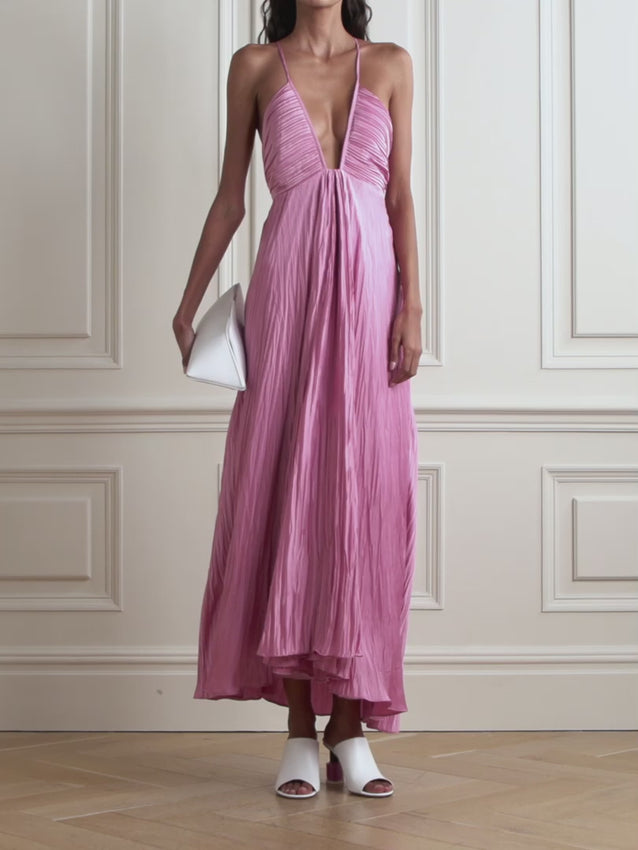 The Angelina plissé-satin maxi dress from A.L.C. offers a graceful silhouette with its delicate pleated satin fabric, ensuring both elegance and comfort. Its flowing design flatters various body shapes while the luxurious texture adds a sophisticated touch to any occasion. Perfect for moments when you want to feel confident and effortlessly stylish.