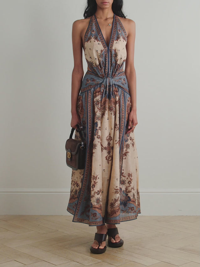 The Ascension Maxi Dress by ZIMMERMANN features a lightweight cotton-voile fabric with a delicate printed design, perfect for warm days. Its halterneck style and open back offer a breezy, flattering fit that keeps you cool and comfortable. This dress combines effortless elegance with practicality, making it an excellent choice for both casual outings and special occasions.