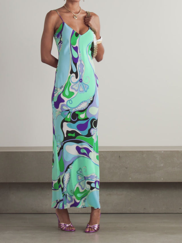 This maxi dress by PUCCI crafted from luxurious silk crepe de chine features an elegant printed design that adds timeless charm. Its lightweight, breathable fabric ensures comfort throughout the day, while the flowing silhouette offers a flattering fit for various occasions. Perfect for elevating your wardrobe with sophistication and ease.