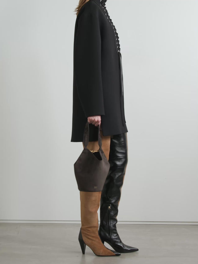 This striking mini dress features signature lace-up detailing that runs through the funnel neckline for an eye-catching design element. Crafted from substantial double-faced crepe, it drapes in an effortlessly relaxed shift silhouette that flatters and moves beautifully. Pair it with your favorite boots for a complete look.